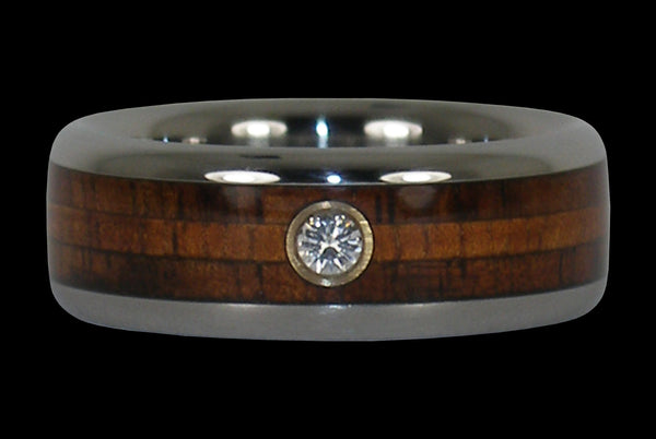 Diamond engagement ring and wedding band on wood grain; Cle Elum,  Washington, United States of America Stock Photo - Alamy